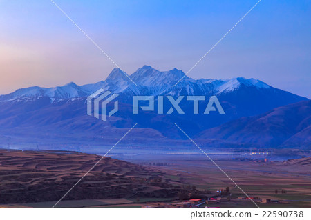 Village inclose mountain in Ganzi 22590738