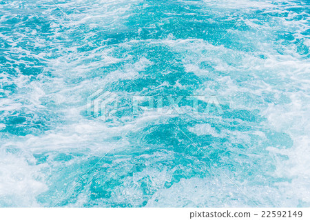 Trail on sea water surface behind boat 22592149