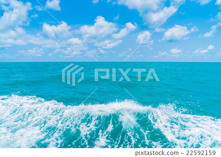 Trail on sea water surface behind boat Trail on sea water surface behind boat 22592159