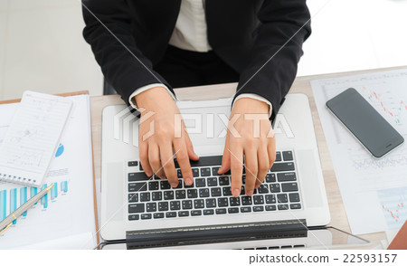 Closeup of business woman hand typing on laptop keyboard 22593157