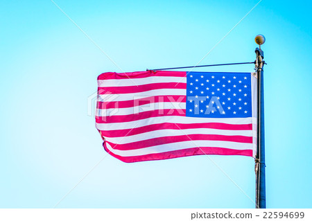 American flag on blue sky American flag on blue sky 22594699