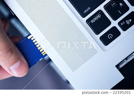Plugging in SD Card into laptop. ready to transfer Plugging in SD Card into laptop. ready to transfer 22595201