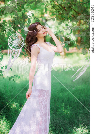 Beautiful girl with long curly hair  22596243