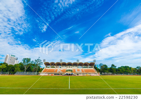 Empty football field stadium with lamps Empty football field stadium with lamps 22598230