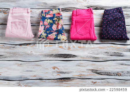 Lady's different color trousers. 22598459