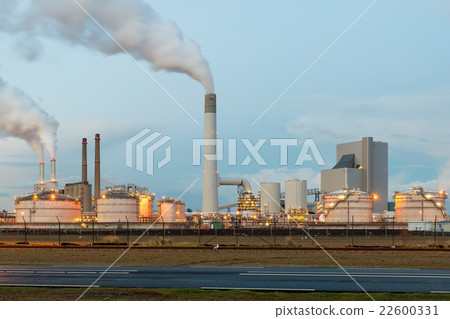 Oil refinery with smoking at twilight 22600331