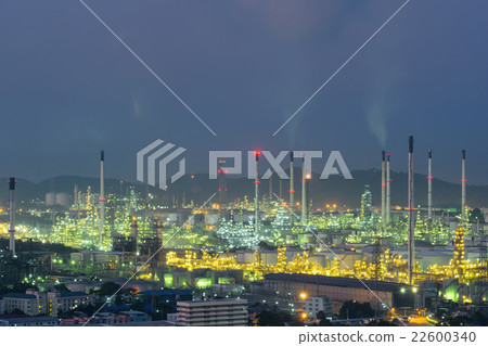 Oil refinery and storage tanks at twilight 22600340