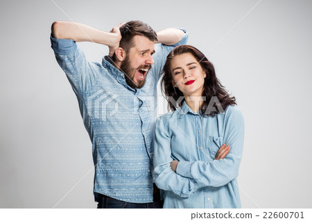 The young couple with different emotions during The young couple with different emotions during 22600701