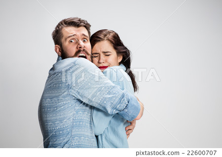 Emotional facial expression wide eyed couple 22600707