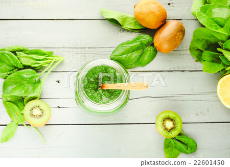 green detox smoothie with spinach in a jar, kiwi green detox smoothie with spinach in a jar, kiwi 22601450