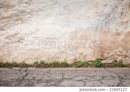 Old concrete wall and cracked asphalt floor Old concrete wall and cracked asphalt floor 22605127