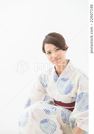 A woman in a yukata A woman in a yukata 22607186