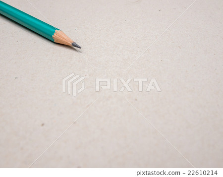 Blank paper and green pencil on the wooden table Blank paper and green pencil on the wooden table 22610214