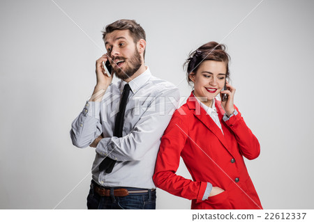 Business concept. The two young colleagues holding Business concept. The two young colleagues holding 22612337