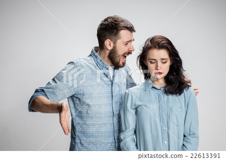 The young couple with different emotions during The young couple with different emotions during 22613391