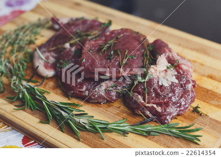 fresh beef meat on a cutting board fresh beef meat on a cutting board 22614354