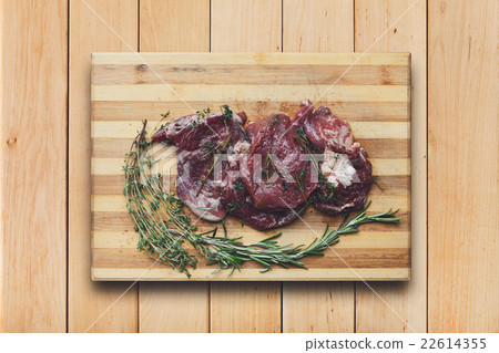 fresh beef meat on a cutting board fresh beef meat on a cutting board 22614355