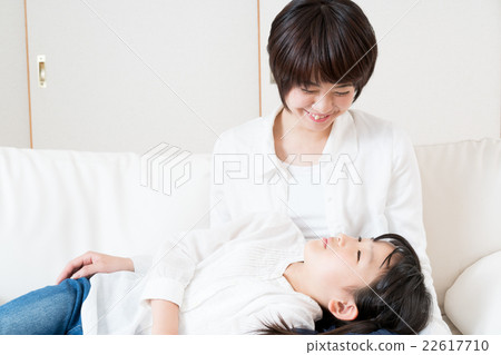 A girl sleeping with a knee pillow 22617710