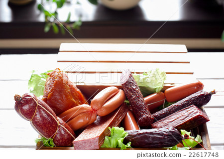 Sausage variety in wooden box close-up 22617748