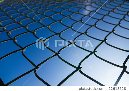Wire mesh and blue sky 22618328