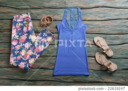 Blue tank top and pants. 22619247