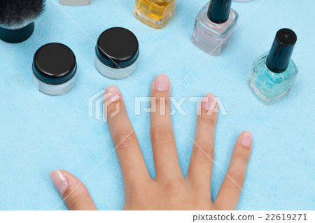 Woman hands on light blue background 22619271