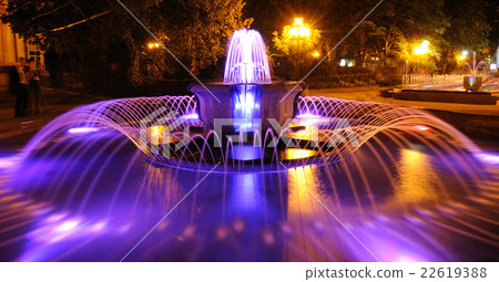 Colored water fountain at night Colored water fountain at night 22619388