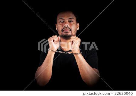 the man was bound by hand in the handcuffed out of freedom 22620040
