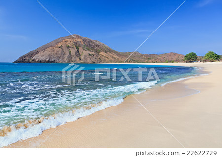 Desert sand beach on ocean bay Mawun in Lombok 22622729