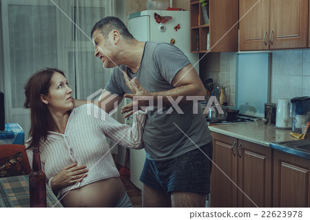Husband beats wife. 22623978