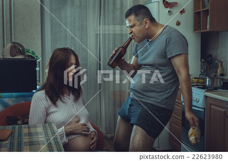 Sad wife, drunken husband. 22623980