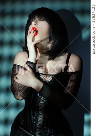 Woman in a corset. Woman in a corset. 22624129