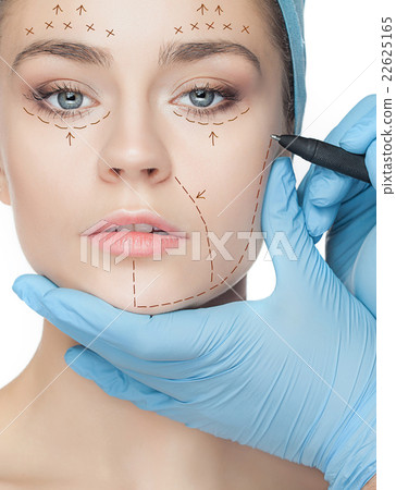Beautiful young woman with perforation lines on 22625165