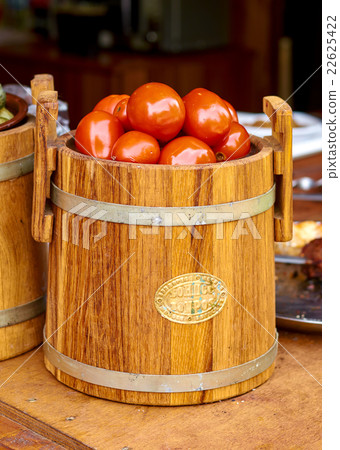 Marinated tomatoes in a barrel. Home cooking 22625422