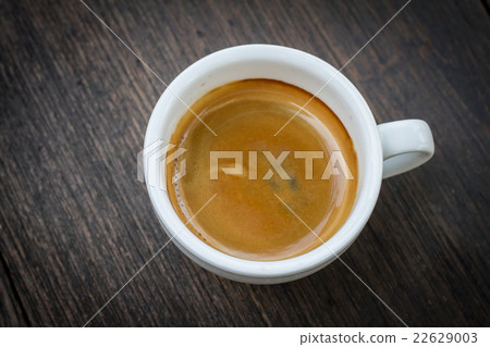 Espresso double shot on wood background vintage 22629003