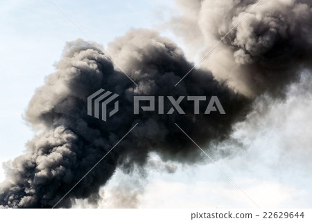 lot of black smoke from the fire 22629644