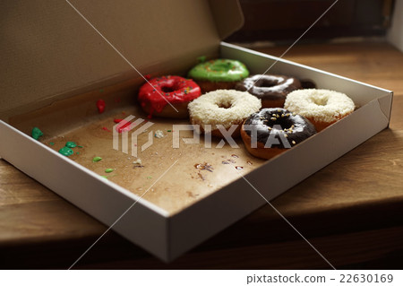 Colorful donuts in box Colorful donuts in box 22630169