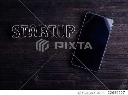 Smartphone and start up sign made of cookie Smartphone and start up sign made of cookie 22630227