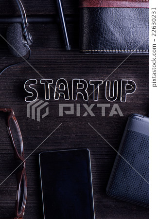 Start up composition. Headset, smart phone, cookie 22630231
