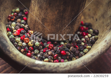 pepper in wooden background/ mixture of peppers 22630259