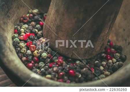 pepper in wooden background/ mixture of peppers 22630260