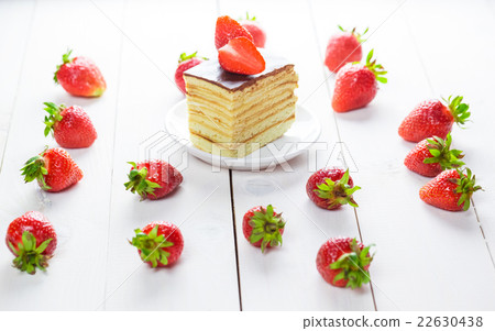 Beautiful delicious homemade cake with strawberrie Beautiful delicious homemade cake with strawberrie 22630438