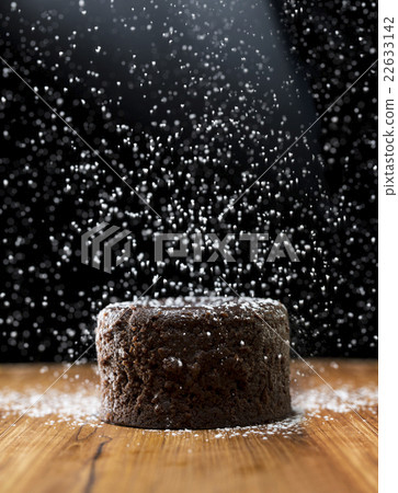 Chocolate Lava Cake with icing sugar. Chocolate Lava Cake with icing sugar. 22633142