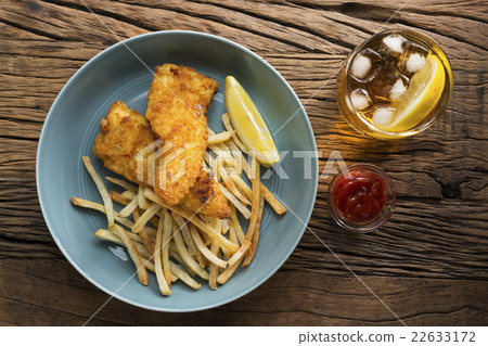 Freshly cooked fish and chips. Freshly cooked fish and chips. 22633172