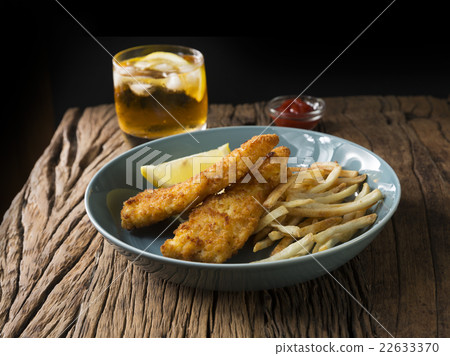 Freshly cooked fish and chips. Freshly cooked fish and chips. 22633370