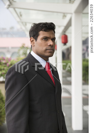 Indian business man in modern Asian city 22634039