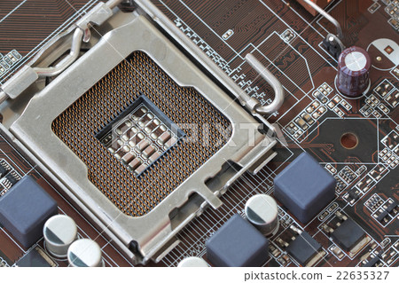 Focus CPU socket on motherboard of computer. 22635327