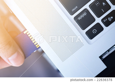 Plugging in SD Card into laptop. ready to transfer 22636378