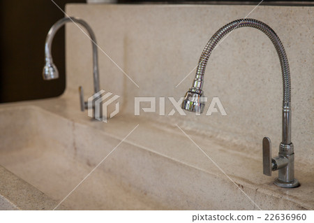 Stainless Steel faucet in the restroom Stainless Steel faucet in the restroom 22636960