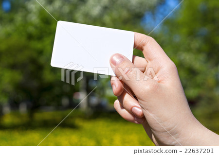 Hand with card vivid 22637201